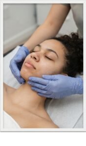 Client getting MLD treatment to face & chin at TAM Physio & Rehab Sharjah